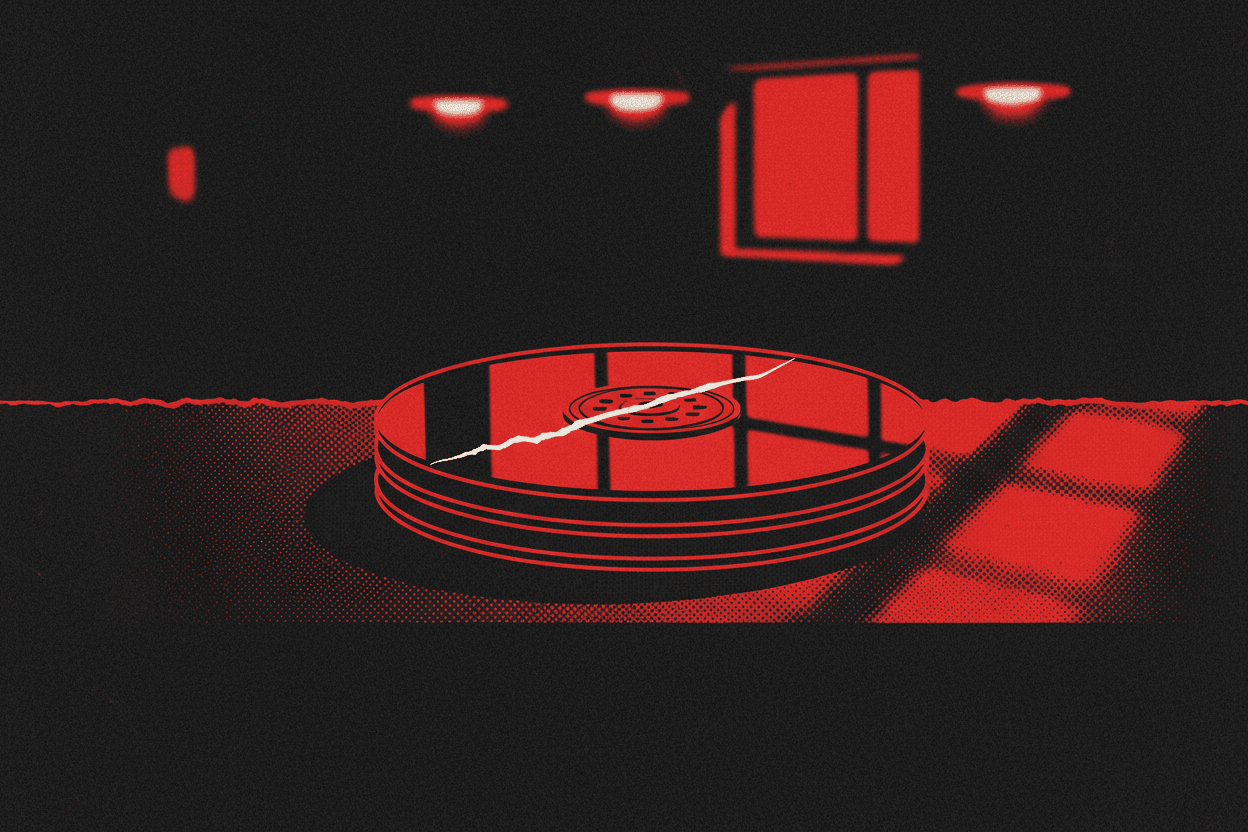 Red and black halftone illustration: a stack of bare hard drive platters on a workbench, the top one carrying a long visible scratch (TheNotificationApp)